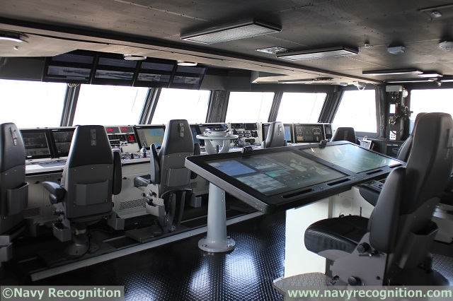 View of the bridge aboard RSS Independence, with the very large, collaborative tablets for the Commanding Officer and his XO.
