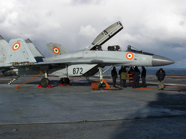 A MiG-29KUB two-seat naval fighter jet made the first touch-and-go landings last week on the Indian Navy aircraft carrier Vikramaditya, Sevmash shipyard said on Monday. The ship is currently undergoing sea trials in the Barents Sea off the north coast of Russia.