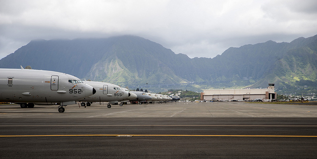 The P-8A Poseidon jet, a replacement maritime patrol aircraft for the P-3C Orion, made its Rim of the Pacific (RIMPAC) exercise debut this year, flown by two air crews from Air Test and Evaluation Squadron (VX) 1 at Marine Corps Base Hawaii in Kaneohe Bay, during the 23rd edition of the biennial exercise .