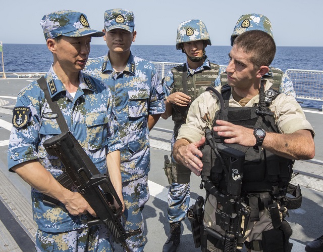 The guided-missile destroyer USS Mason (DDG 87) participated in a counter piracy exercise in the Gulf of Aden with elements of the Chinese People's Liberation Army (Navy) (PLA(N)), Aug. 24-25. Mason joined Chinese destroyer Harbin (DDG 112) and Chinese auxiliary replenishment oiler Weishanhu (AO 887) to conduct a series of evolutions including combined visit, board, search and seizure (VBSS), live-fire proficiency, and aviation operations to enhance bilateral interoperability in the U.S. 5th Fleet area of responsibility (AOR).