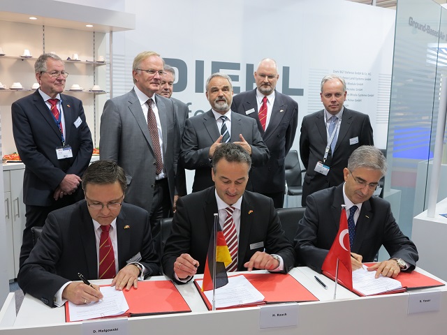 The Turkish company Roketsan and the German IDAS Consortium formed by ThyssenKrupp Marine Systems and Diehl BGT Defence signed a cooperation agreement to develop and supply the submarine-launched IDAS (= Interactive Defence and Attack System for Submarines) missile. The accord was inked at the IDEF Trade Show in Istanbul on May 9, 2013. The signature ceremony took place in the presence of Thomas Kossendey, member of the German Parliament and parliamentarian secretary to the federal minister of defence and the German Armament Director Detlef Selhausen.