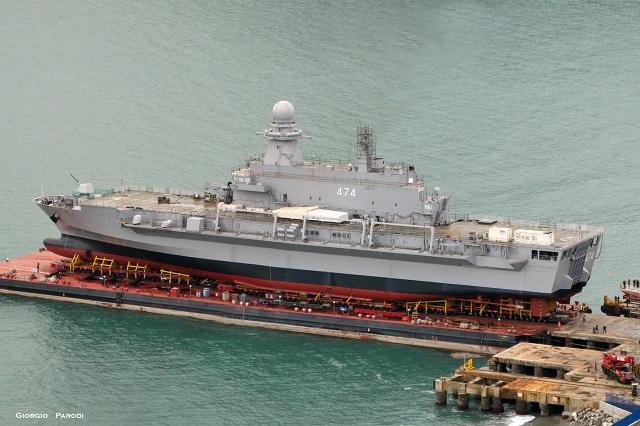 On January 8, 2014 at the Fincantieri shipyard in Riva Trigoso (Genoa) the Algerian Navy future BDSL (Batiment de Débarquement et de Soutien Logistique) amphibious vessel was launched on a barge. According to our sources, the ship (who will be named Kalaat Beni-Abbes) will then be towed to its final completion site of the shipyard Fincantieri in Muddzhiano (La Spezia) 