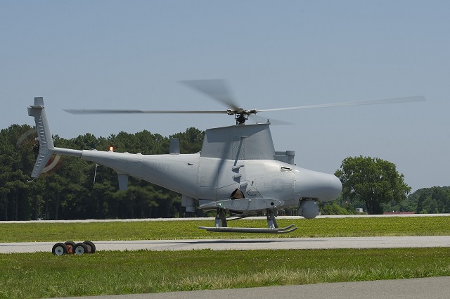 The MQ-8 Fire Scout prepares to land after its first flight with a new maritime surface search radar June 16 at Webster Field Annex, Md. This upgrade will increase the situational awareness and threat warning in a high-traffic littoral environment. Fire Scout's deployment with the new radar is planned for 2015. (Photo Courtesy of U.S. Navy)
