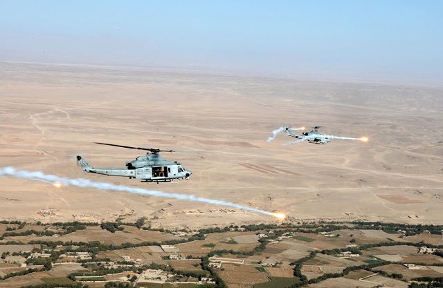The U.S. Marine Corps' AH-1W and UH-1Y Light/Attack helicopters fire the Advanced Precision Kill Weapons System in October 2012. (U.S. Navy photo)