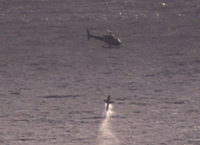 An Airbus Helicopters AS350 Écureuil (Squirrel) recovers the target (Picture: DGA)