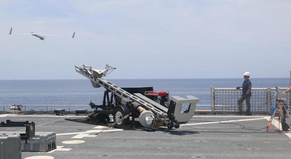 USNS Spearhead (JHSV 1), operated by the Military Sealift Command (MSC), completed Fleet Experimentation (FLEX) period two from July 15 - 22. Southern Partnership Station-Joint High Speed Vessel 2015 FLEX phase 2 explored JHSV's ability to support broader maritime C2 capabilities, by supporting the organic deployment of two un-manned aerial systems (UAS), Scan Eagle and RQ-20A (Puma). 