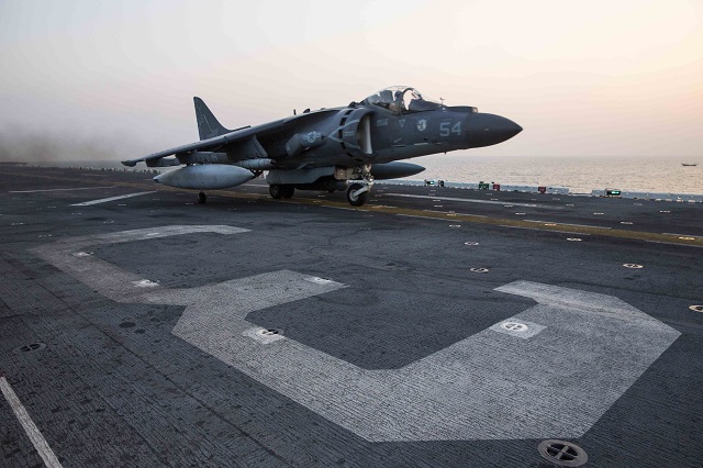 ARABIAN GULF (Nov. 19, 2015) An AV-8B Harrier assigned to Marine Medium Tiltrotor Squadron (VMM) 162 (Reinforced), 26th Marine Expeditionary Unit (26th MEU), launches from the amphibious assault ship USS Kearsarge (LHD 3) to conduct their first missions over Iraq in support of Operation Inherent Resolve. Kearsarge is deployed to the U.S. 5th Fleet, supporting Operation Inherent Resolve, the effort to degrade and ultimately destroy ISIL; maritime security operations; and regional theater security cooperation efforts. (U.S. Navy photo by Mass Communication Specialist Seaman Apprentice Ryre Arciaga/Released)