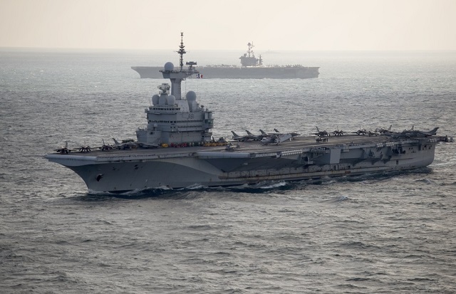 The French Navy (Marine Nationale) announced that on 30 January 2016, U.S. Navy Rear Admiral Bret C. Batchelder, Commander of Carrier Strike Group 8 (CSG 8) and Harry S Truman Carrier Strike Group visited French aircraft carrier Charles de Gaulle to meet his counterpart, French Navy Rear Adm. Rene-Jean Crignola, Commander Task Force (CTF) 50.