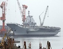 China's first aircraft carrier, the Liaoning, left its homeport of Qingdao in east China's Shandong Province for the South China Sea on Tuesday on a scientific and training mission.