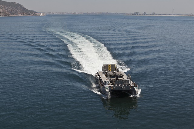 French company CNIM just released a new stunning video featuring its L-CAT landing catamaran. L-CAT is a fast landing craft dockable adapted to modern LPD/LHD. With is patented lift platform, it is the only vessel able to accomplish amphibious operation with high payload in rough seas or shallow water, Chosen by the French Navy in 2009, L-CAT is a new generation of expeditionary transport system for military purposes, humanitarian operations, and civilian logistics support. 