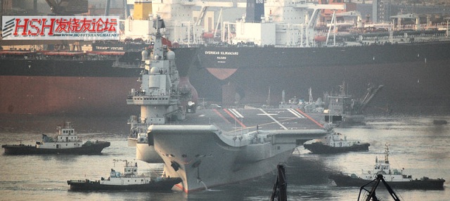 Chinas's refitted aircraft carrier has sailed out from Dalian port for its longest sea trial to date: It will last 25 days. Shenyang J-15 fighters may be involved in this sea trial which would make it a first.