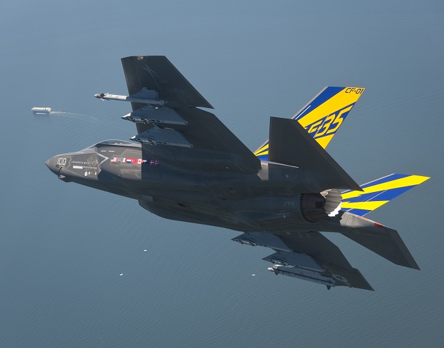 The carrier variant of the F-35 Joint Strike Fighter flew for the first time with external weapons June 27. Navy test pilot Lt. Christopher Tabert flew CF-1 with inert AIM-9X Sidewinder air-to-air missiles on port and starboard pylons to measure flying qualities and aircraft vibrations.