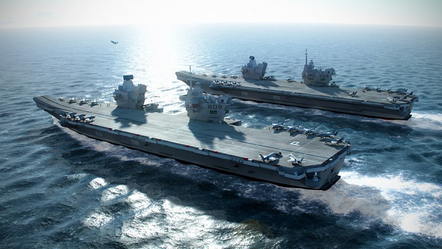 Workers at BAE Systems on moved sunday the biggest section of HMS QUEEN ELIZABETH, the first of two new aircraft carriers for the Royal Navy, out of the company’s shipbuilding hall at Govan for the first time.