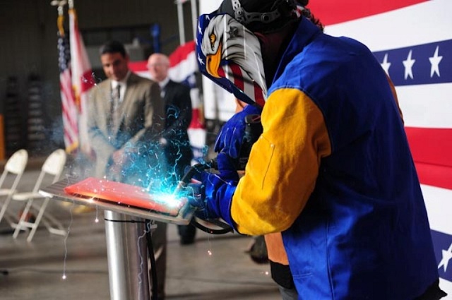 Austal held a keel-laying ceremony today for the third Independence-variant Littoral Combat Ship (LCS) – Jackson (LCS 6), one of five Austal-designed 127-metre US Navy Independence-variant Littoral Combat Ships under contract with the US Navy. Dr. Katherine Holmes Cochran, the ship’s sponsor, was present to weld her initials onto the keel plate as the Keel Authenticator. She was assisted by J.B. Craig, III, who is an “A” Class welder that has been part of the Austal team since November of 2011. 