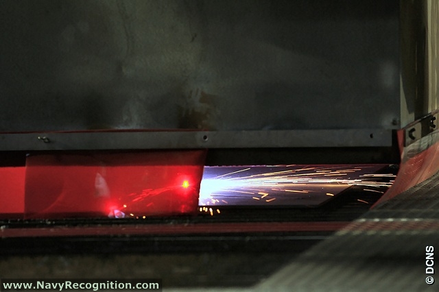 8 October 2009: Laser cutter cuts first plate for FREMM frigate Normandie