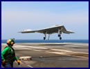 USS GEORGE H. W. BUSH, at sea (NNS) -- The X-47B Unmanned Combat Air System (UCAS) demonstrator completed its first-ever carrier-based arrested landing on board USS George H.W. Bush (CVN 77) off the coast of Virginia July 10. 