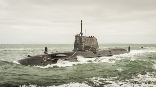 HMS Ambush, the Royal Navy’s most advanced attack submarine was commissioned into the Royal Navy to become “Her Majesty’s Ship” during a ceremony overseen by the submarine’s crew, Naval Base, workers and around 500 invited guests. MS Ambush has officially joined the Royal Navy fleet following a ceremony. The nuclear-powered submarine arrived at her home port of HM Naval Base Clyde in September last year where she has been undergoing sea trials before entering operational service later this year.