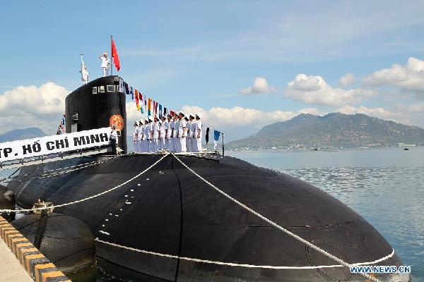 Vietnam received two submarines on Thursday and Prime Minister Nguyen Tan Dung said that it marked new development of Vietnamese navy and army. Dung made the remarks at a national flag-raising ceremony to the two Russia-made Kilo class submarines held in central Cam Ranh port on Thursday.