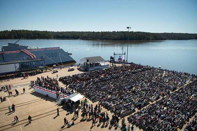 BATH, Maine (April 12, 2014) Secretary of the Navy (SECNAV) Ray Mabus and other honored guests attend the christening ceremony for the Zumwalt-class guided-missile destroyer (DDG) 1000. The ship, the first of three Zumwalt-class destroyers, will provide independent forward presence and deterrence, support special operations forces and operate as part of joint and combined expeditionary forces. The lead ship and class are named in honor of former Chief of Naval Operations Adm. Elmo R. "Bud" Zumwalt Jr., who served as chief of naval operations from 1970-1974. (U.S. Navy photo by Mass Communication Specialist 1st Class Arif Patani/Released)