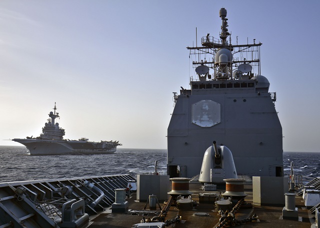 U.S. Navy Ticonderoga-class guided missile cruiser USS Vicksburg’s (CG 69) sailing alongside French Navy nuclear-powered Charles de Gaulle (R91). Picture: NATO
