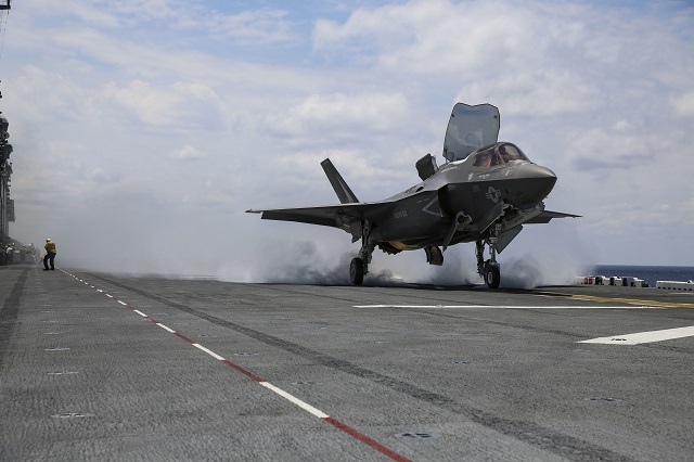 An F-35B Lightning II takes off on the flight deck of USS Wasp (LHD-1) during routine daylight operations, a part of Operational Testing 1, May 22. The F-35B is the future of Marine Corps aviation and will be replacing three legacy platforms: The AV-8B Harrier, the F/A Hornet and the EA-6B Prowler. The F-35B is with Marine Fighter Attack Training Squadron 501, Marine Aircraft Group 31, 2nd Marine Aircraft Wing. (Marine Corps photo by Cpl. Anne K. Henry/RELEASED)