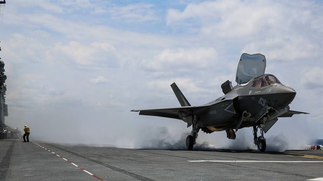 An F-35B Lightning II takes off on the flight deck of USS Wasp (LHD-1) during routine daylight operations, a part of Operational Testing 1, May 22. The F-35B is the future of Marine Corps aviation and will be replacing three legacy platforms: The AV-8B Harrier, the F/A Hornet and the EA-6B Prowler. The F-35B is with Marine Fighter Attack Training Squadron 501, Marine Aircraft Group 31, 2nd Marine Aircraft Wing. 
