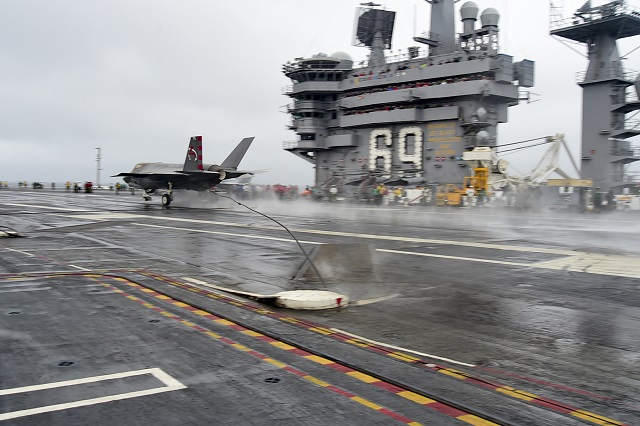 Two F-35C Lightning II carrier variants conducted their first arrested landings aboard USS Dwight D. Eisenhower (CVN 69) off the coast of the eastern United States on Oct. 2. U.S. Navy test pilots Cmdr. Tony "Brick" Wilson and LT Chris "TJ" Karapostoles landed F-35C test aircraft CF-03 and CF-05, respectively, aboard USS Eisenhower's flight deck. The arrested landing is part of the F-35's two week at-sea Developmental Testing (DT-II) phase.
