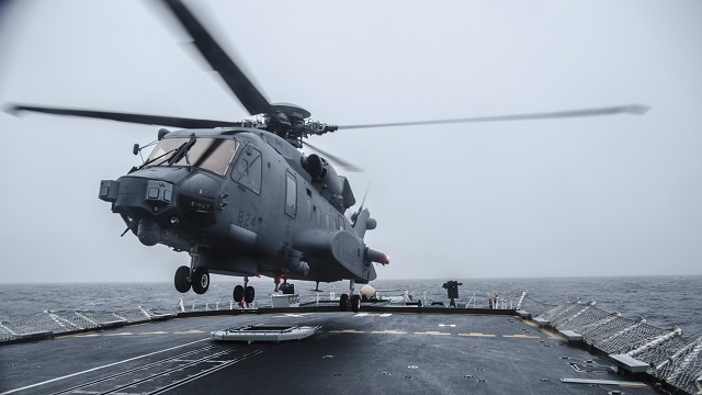 A CH-148 Cyclone helicopter practices landing procedures on Her Majesty’s Canadian Ship Halifax off the coast of Nova Scotia on January 27, 2016