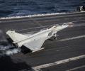 MEDDITERRANEAN SEA (Dec. 8, 2016) A French navy Rafale Marine aircraft from the aircraft carrier FS Charles De Gaulle (R91) performs a touch and go landing on the flight deck of the aircraft carrier USS Dwight D. Eisenhower (CVN 69) (Ike). Ike, currently deployed as part of the Eisenhower Carrier Strike Group, is conducting naval operations in the U.S. 6th Fleet area of operations in support of U.S. national security interests in Europe. (U.S. Navy photo by Petty Officer 3rd Class Christopher A. Michaels)